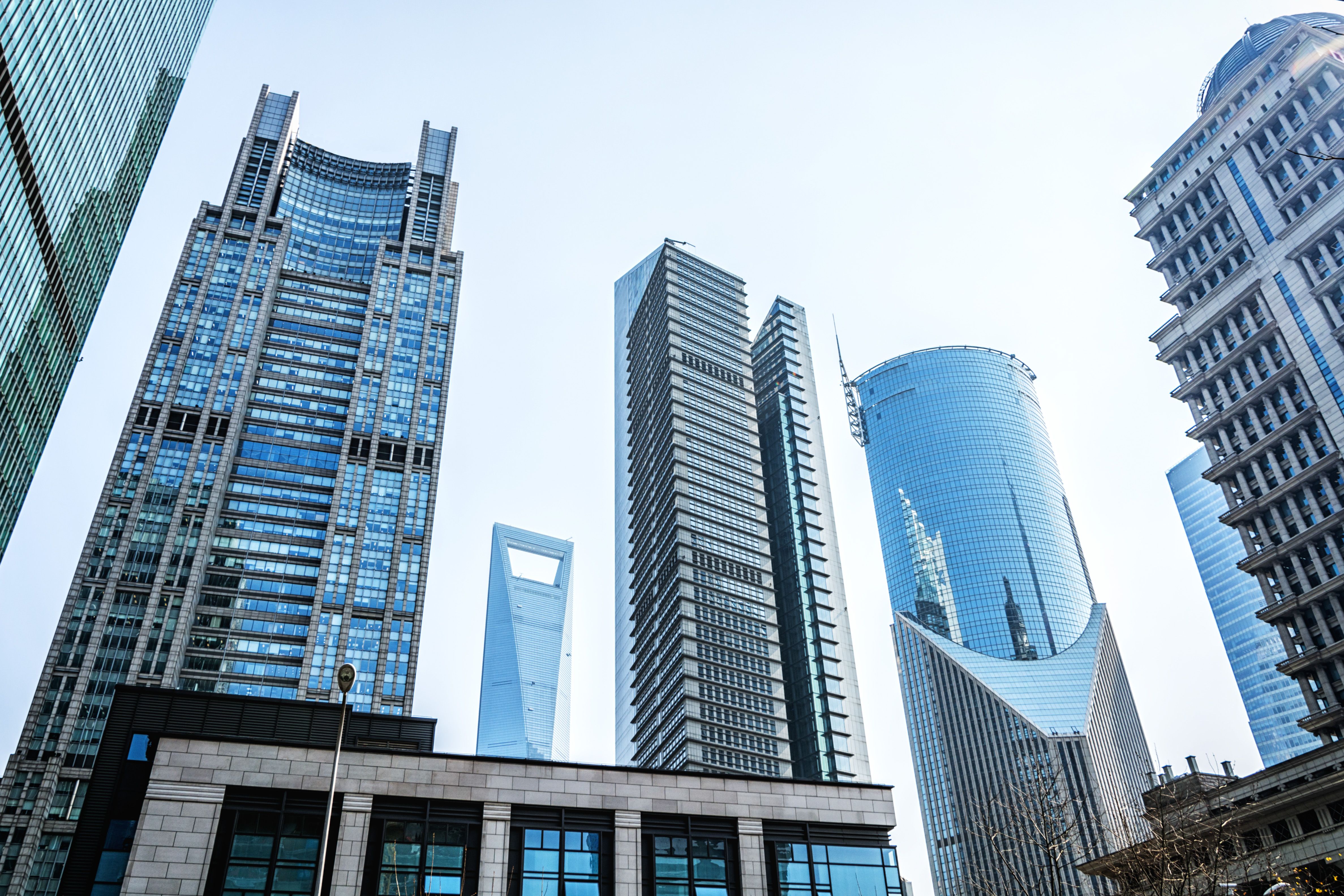 Can NRIs Buy Property in India 2026? FEMA Rules, Tax Treatment and the SM REIT Route for Managed Commercial Real Estate Income